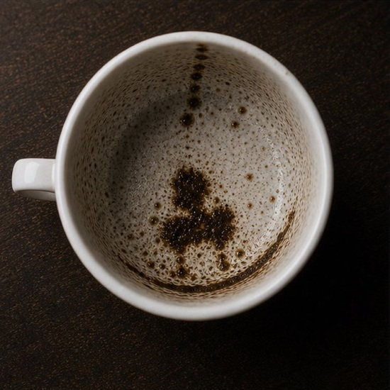 CLOVER (four leaf) coffee grounds symbol photo variation 2