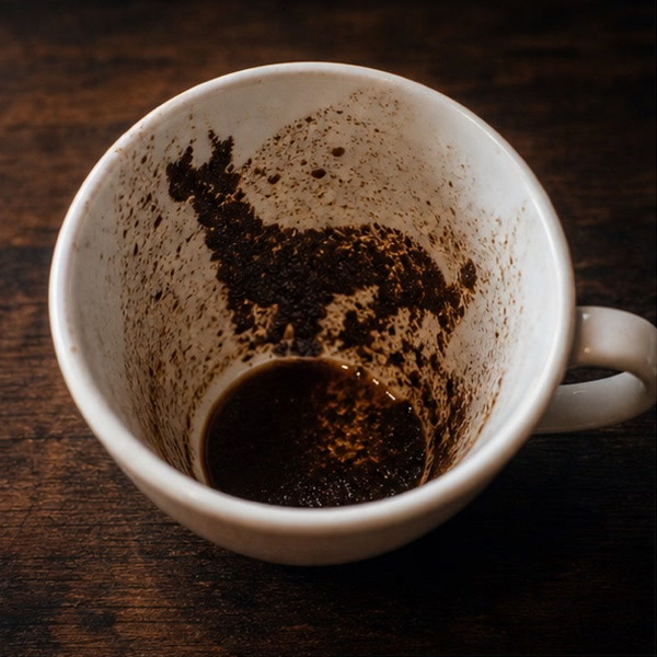 COW coffee cup symbol photo and tasseography meaning
