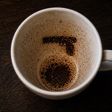 GUN coffee cup symbol photo and tasseography meaning