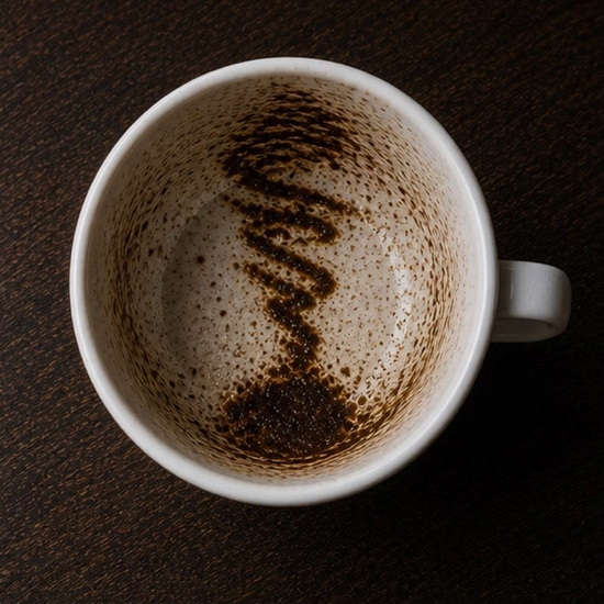 TORNADO OR WHIRLWIND coffee cup symbol photo and tasseography meaning