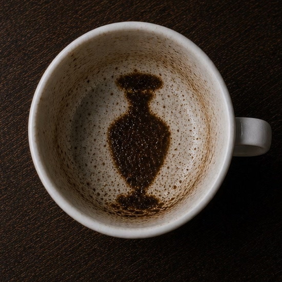 URN coffee cup symbol photo and tasseography meaning
